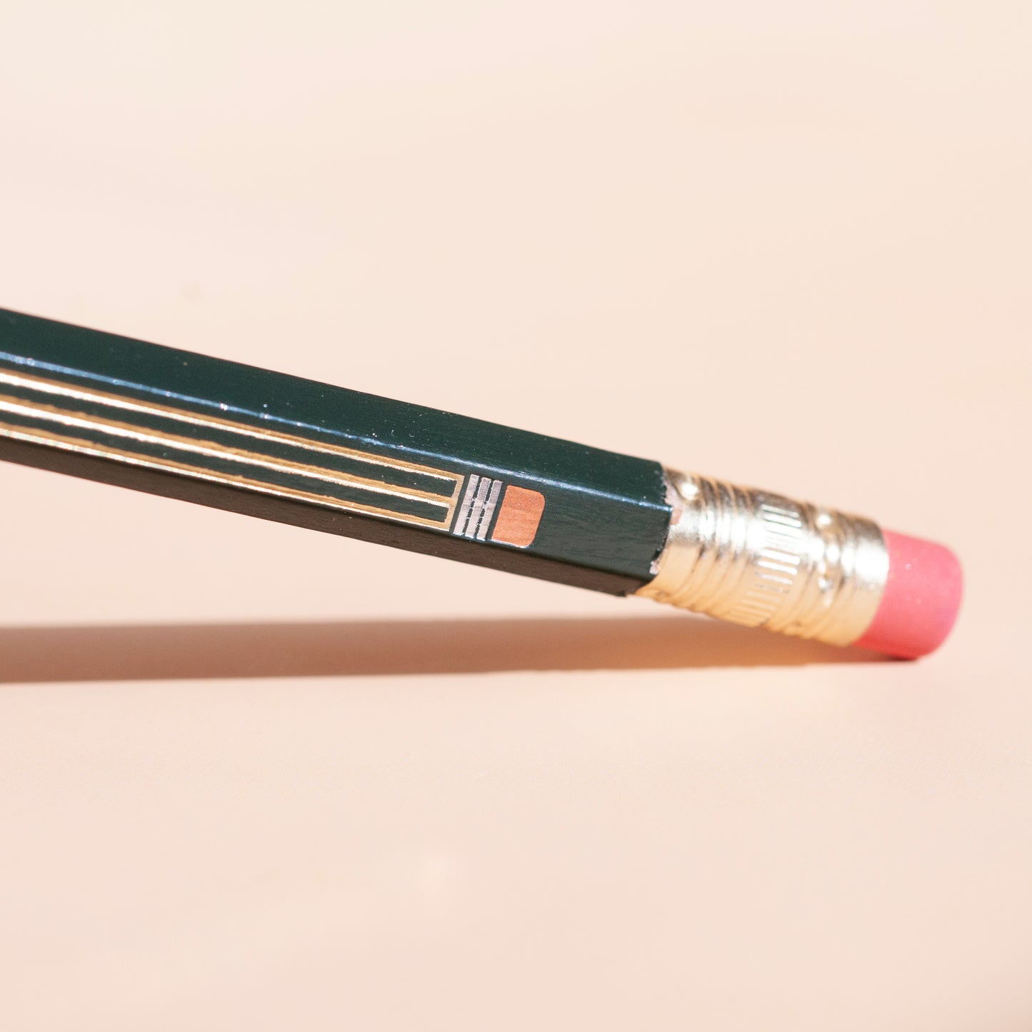 Pencil on pencil macro metallic foil design