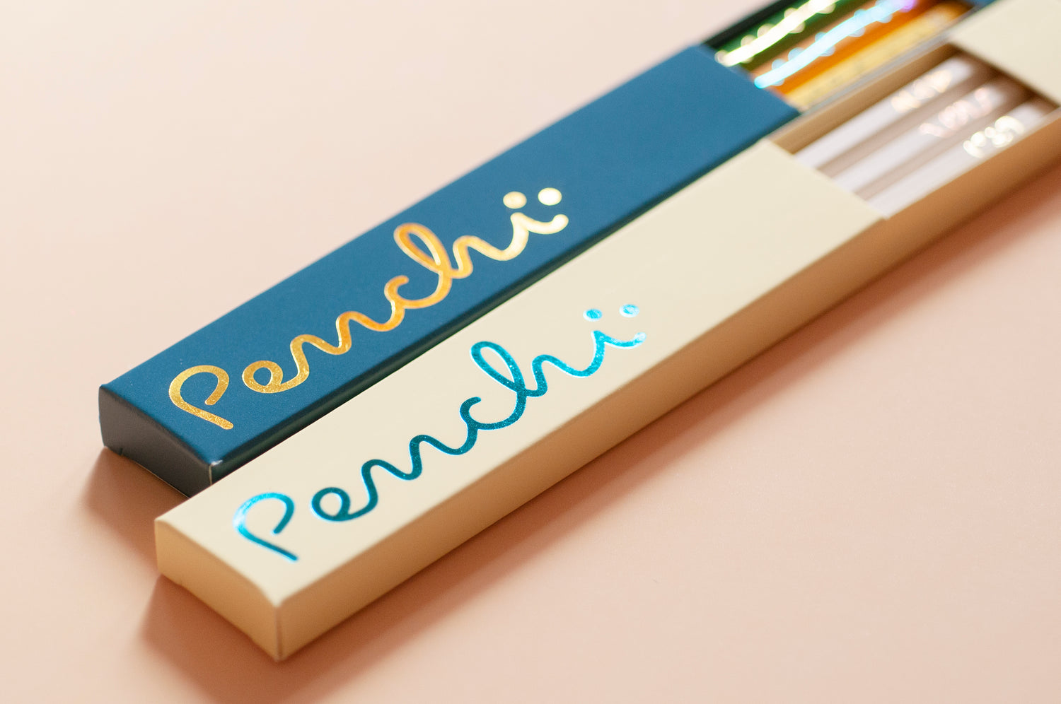 Penchi pencil set box packaging featuring shiny metallic accents made with gold and blue hot foil