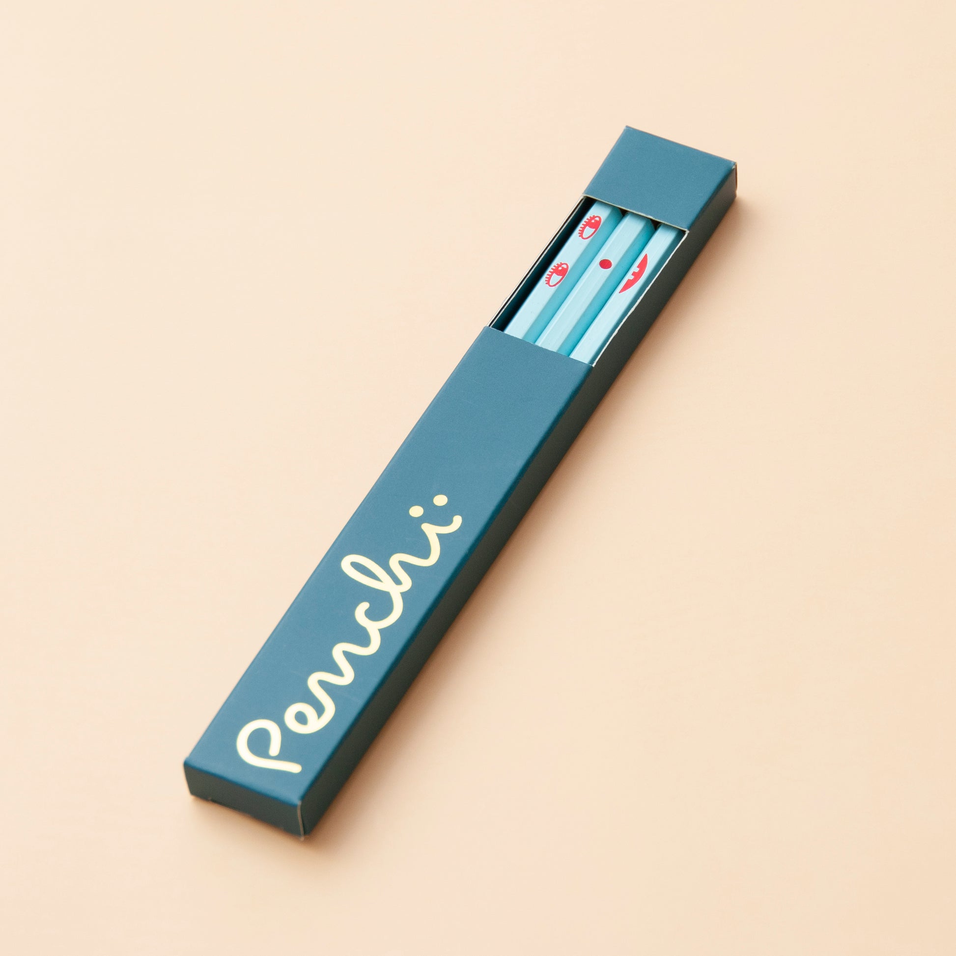 Unique pencil set featuring two faces, a happy face on the front and a sad face on the back. The design spans 3 pencils. Mix and match facial expressions. Packaged in pencil box with window.