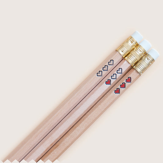 Hot foil-stamped pencil set with pixel heart containers