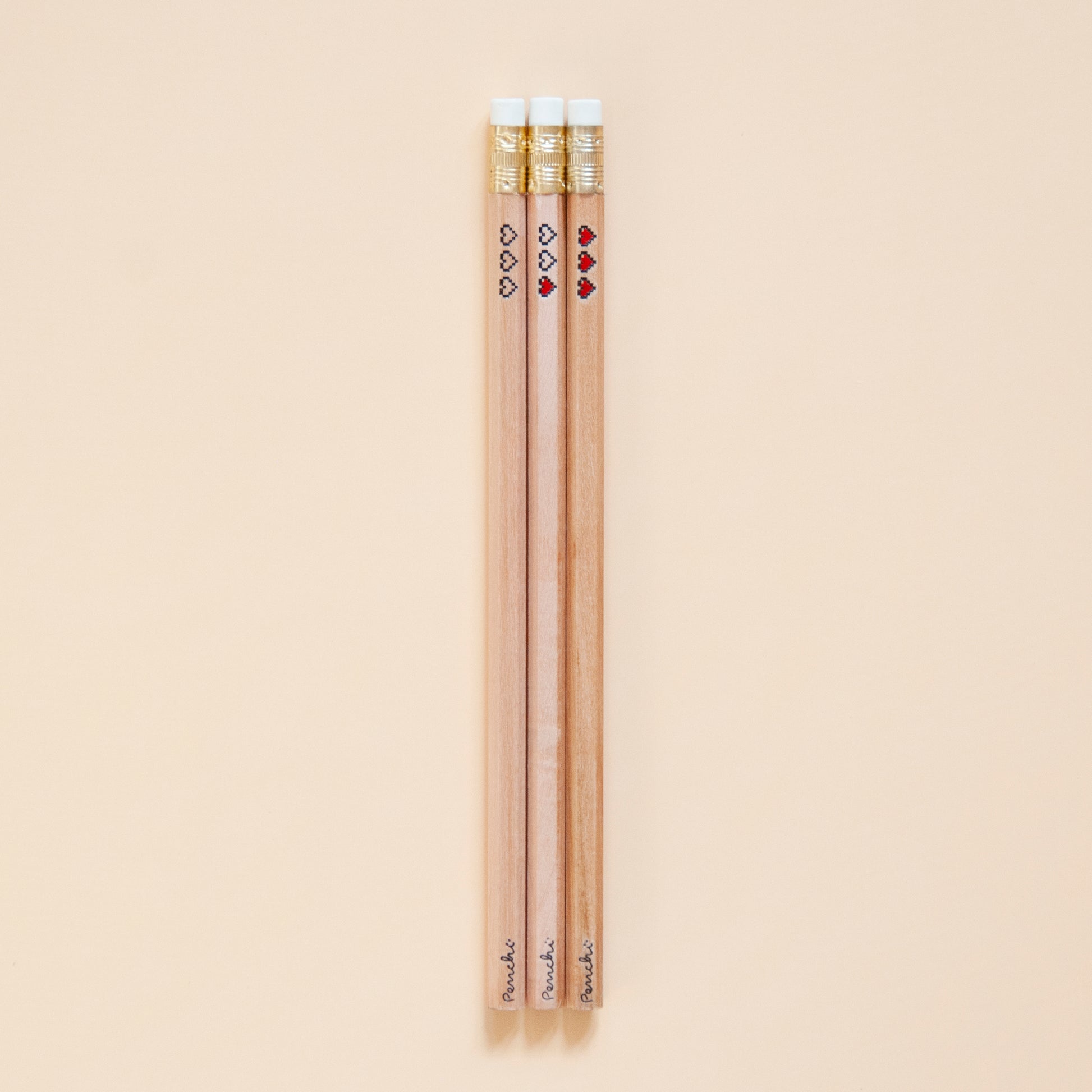 Hot foil-stamped pencil set with pixel heart containers, black and red, full scale