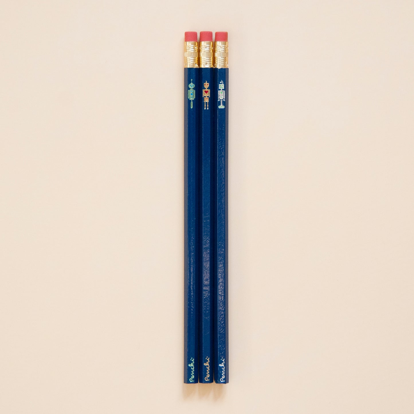 Full scale photo of robot pencil set, stamped by hand in Toronto using metallic hot foils, dark blue pencil base