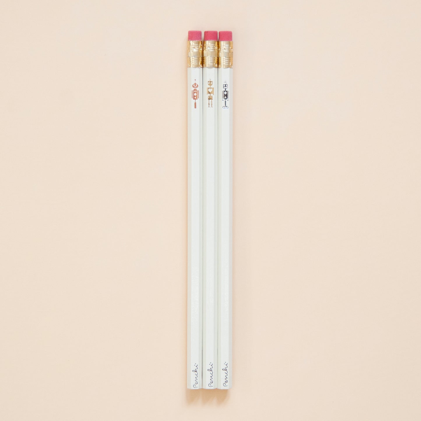 Full scale photo of robot pencil set, stamped by hand in Toronto using metallic hot foils, neutral shades