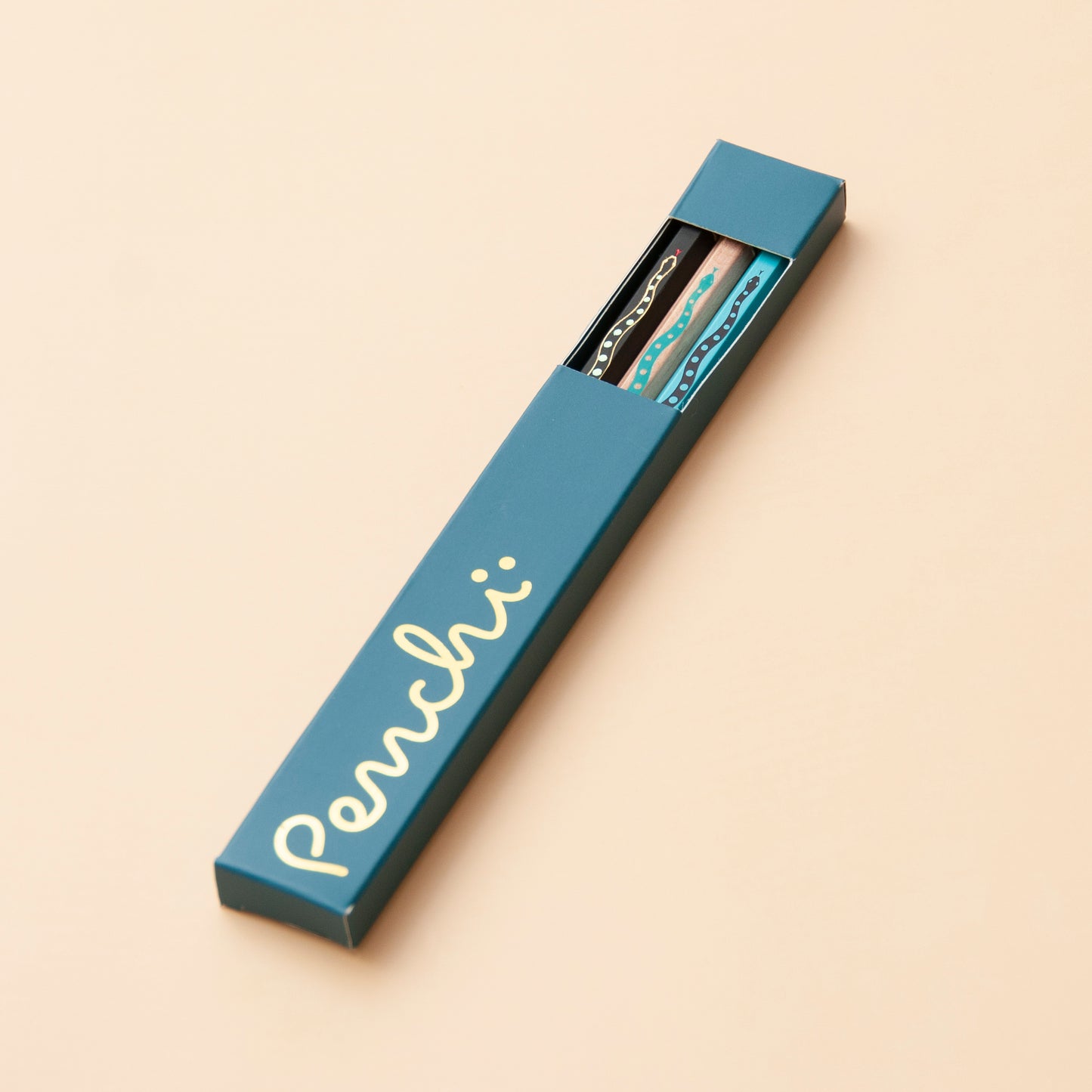 Hot-foil stamped snake pencil set in box packaging with window