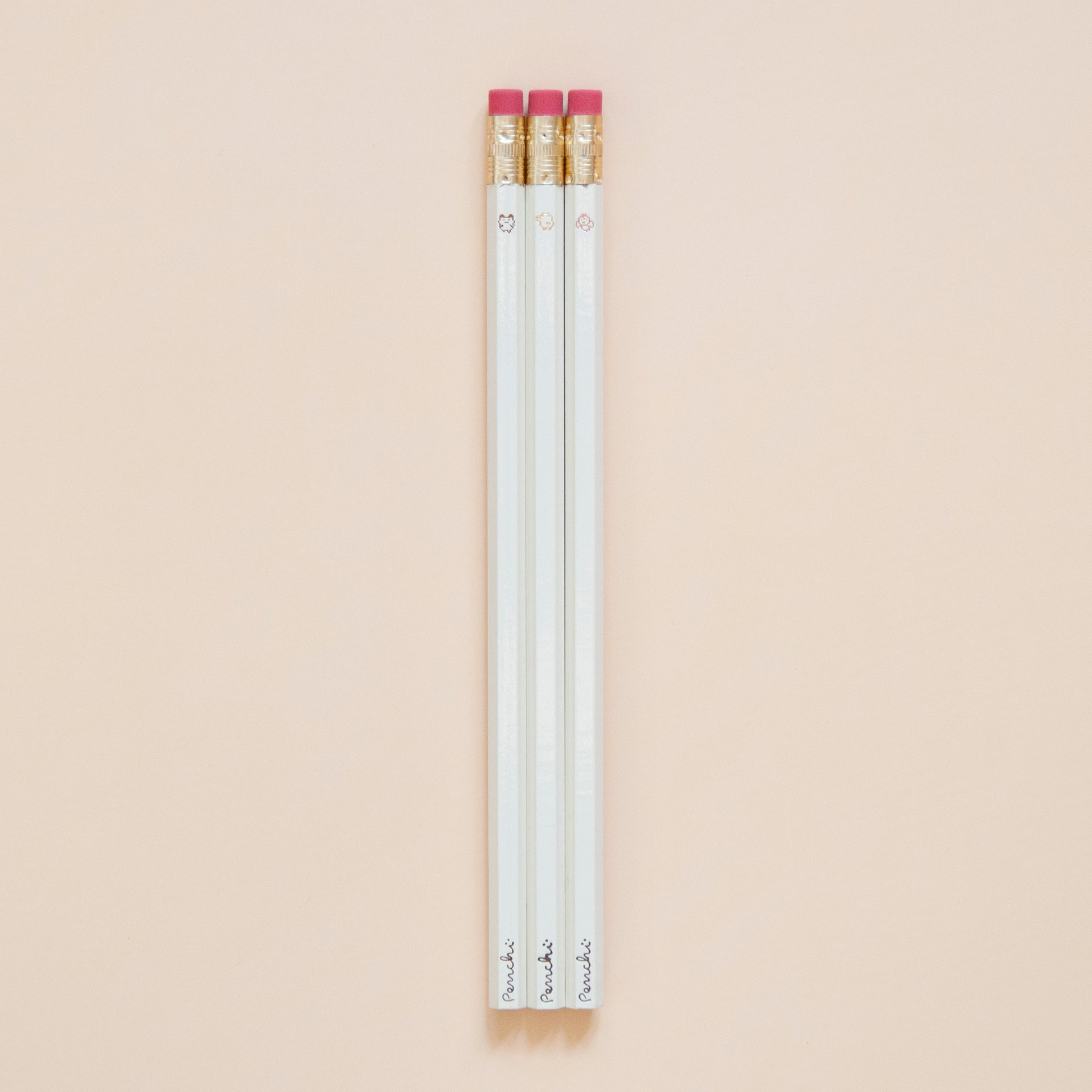 Oldschool tamgotchi characters wooden pencil set, hand-made with hot foil, neutral shades