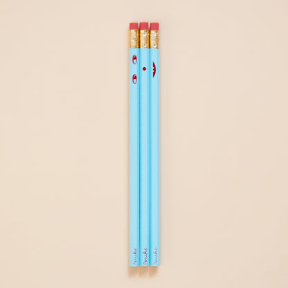 Creative face pencil set. Happy on the front and sad on the back. Hand-stamped using metallic hot-foils on wooden hexagonal pencils, light blue with red