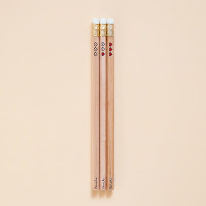 Hot foil-stamped pencil set with pixel heart containers, black and red, full scale