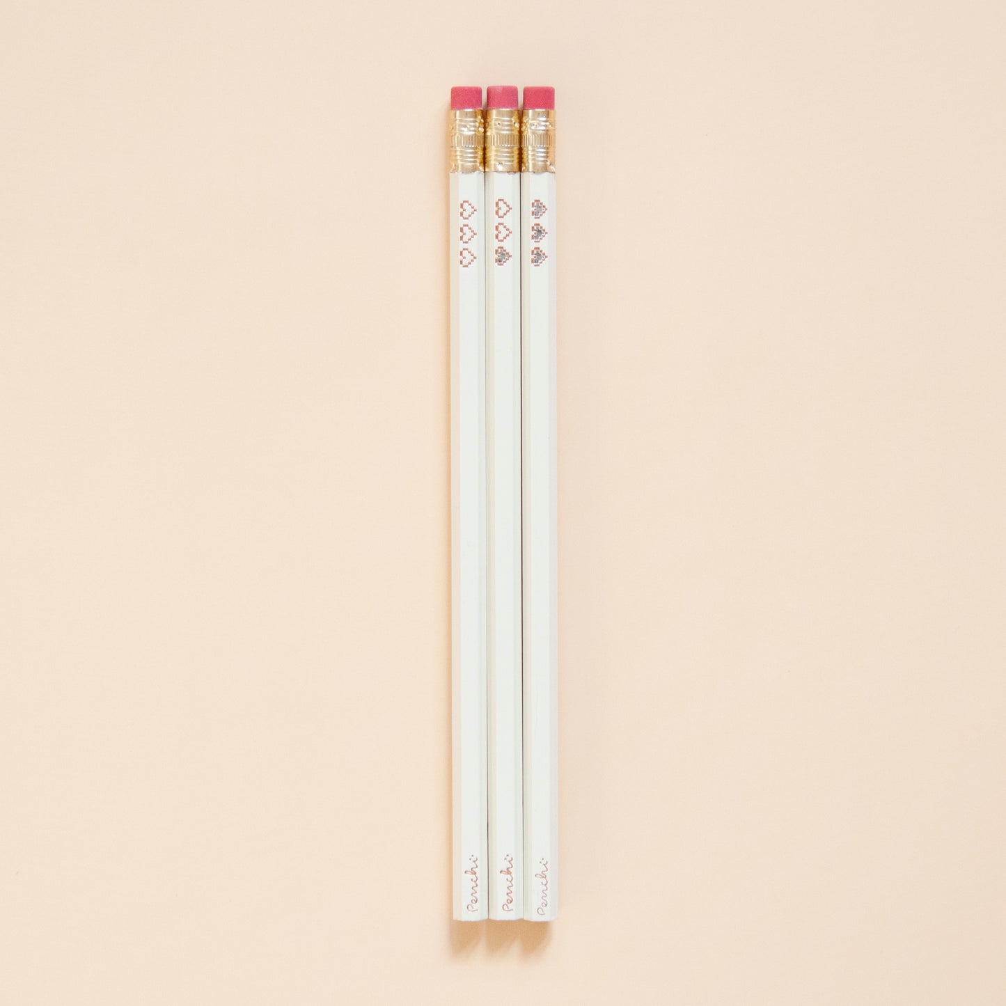 Hot foil-stamped pencil set with pixel heart containers, neutral tones, full scale