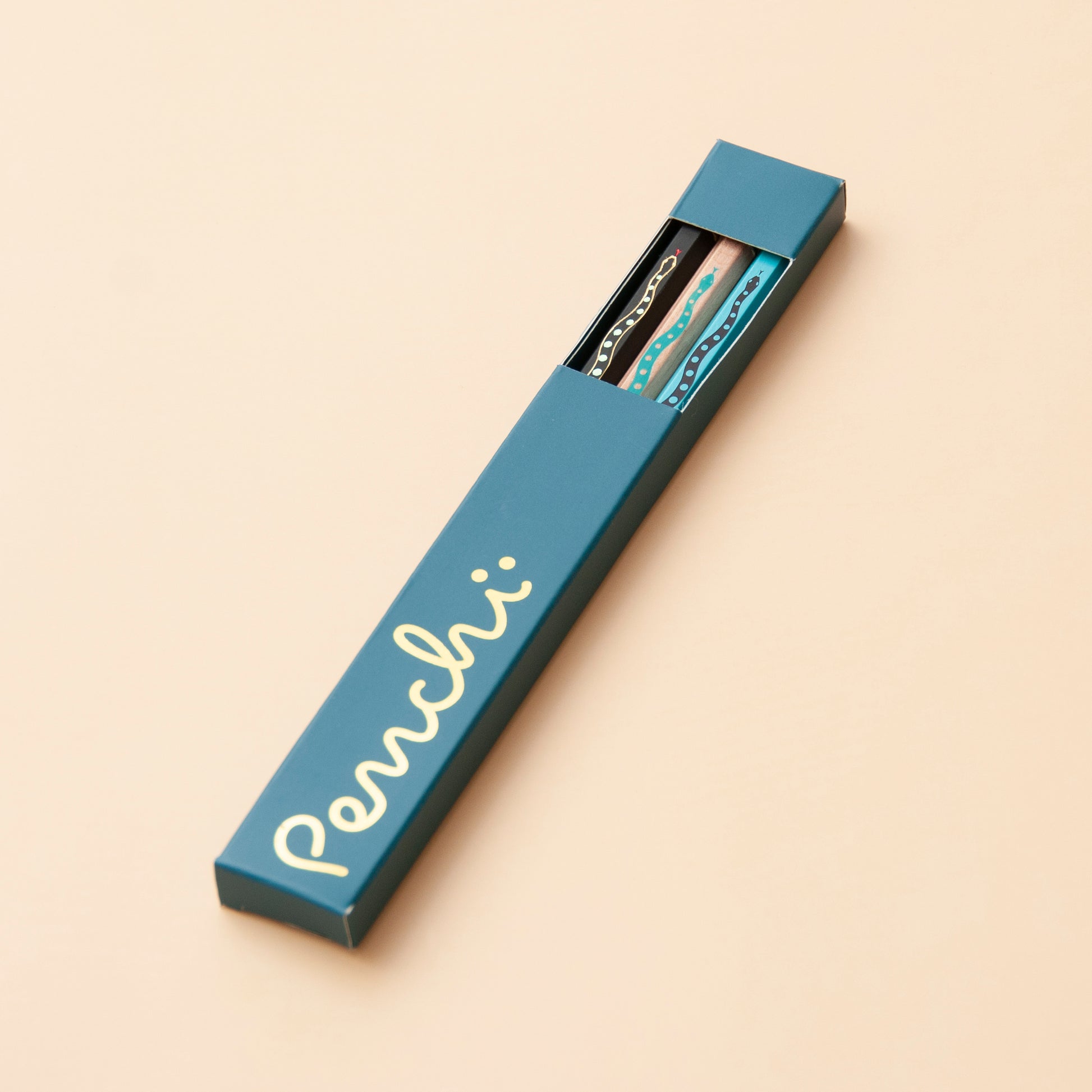 Hot-foil stamped snake pencil set in box packaging with window