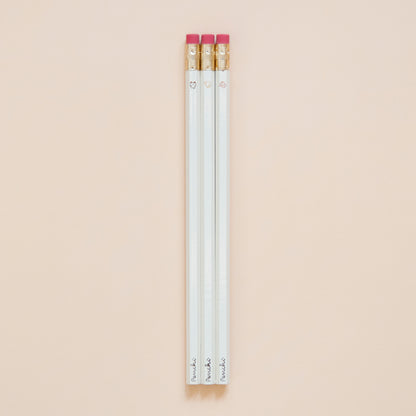 Oldschool tamgotchi characters wooden pencil set, hand-made with hot foil, neutral shades